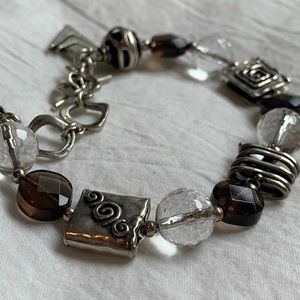 Sterling silver bracelet w/ brown and clear stones